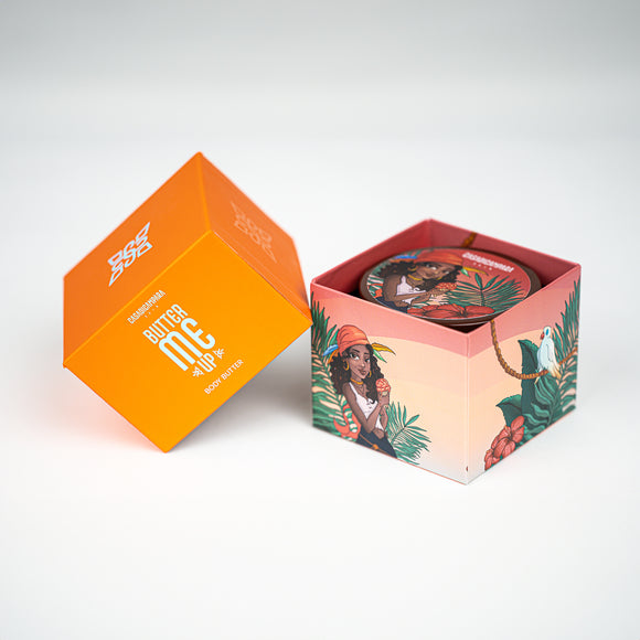 Square body care container of shea butter with an orange lid and an illustration of a girl on the lower part.