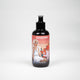 Brown pump bottle of shower gel featuring an animated girl in beachwear - fun and refreshing skincare product.