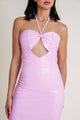 ChatGPT said:
Woman wearing a vibrant pink halter neck dress with a side slit, embodying the elegant and sophisticated style of the Macao collection.