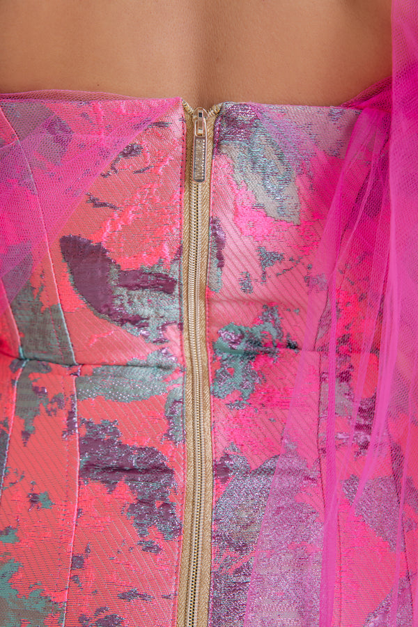 Close-up of Casa di Campara pink floral dress back with gold zipper and pink tulle detail.