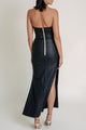 Back view of the Macao Casino black dress showing open back and elegant drape.