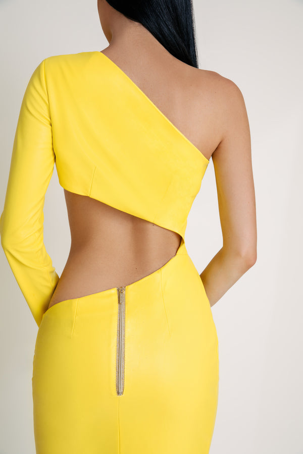 Back view of the yellow Pearl of the Orient dress featuring zip detail and asymmetrical cut-out.