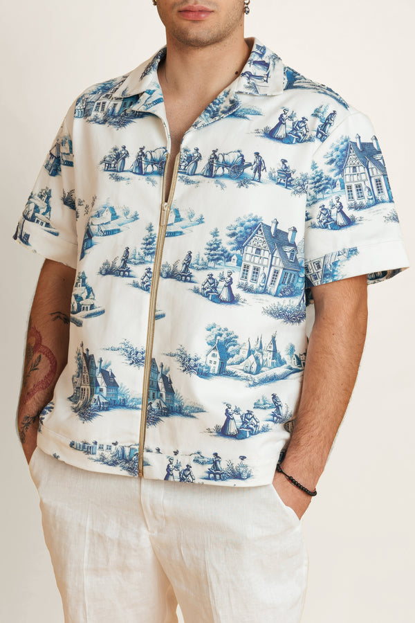 Unisex shirt with classic blue and white print featuring detailed geometric and floral patterns.
