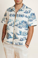Unisex shirt with classic blue and white print featuring detailed geometric and floral patterns.