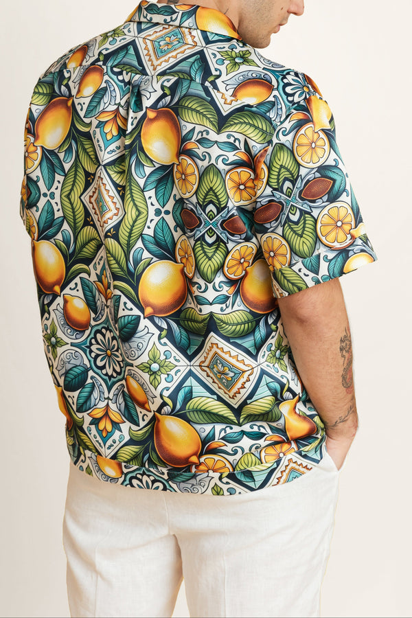 Back view of unisex summer shirt - relaxed fit, easy to pair with shorts or a crop top vibe.