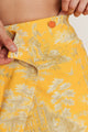 Close-up of premium cotton Golden Porto skirt, light yellow print -perfect yellow skirt for garden party or summer top pairing.