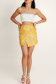 Woman in Golden Porto Summer skirt by Casa Di Campara, made of premium cotton. Comfortable and flattering for many occasions.