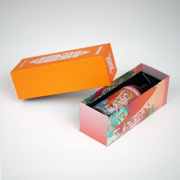 Open packaging of body lotion with orange lid and surfer girl illustration, containing the product bottle inside.
