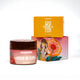 Body scrub packaging focused on orange box with beachwear girl illustration, ideal for summer body care routine.