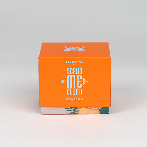 Square orange body scrub packaging with bold white brand and product name, ideal for exfoliating skincare routine.